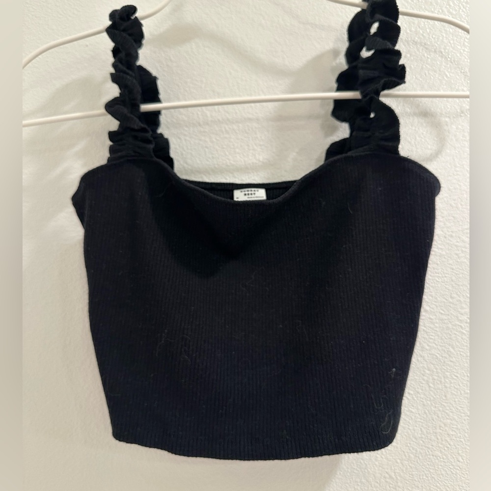 Aritzia exclusive brand : Sunday Best crop black top with ruffle straps.